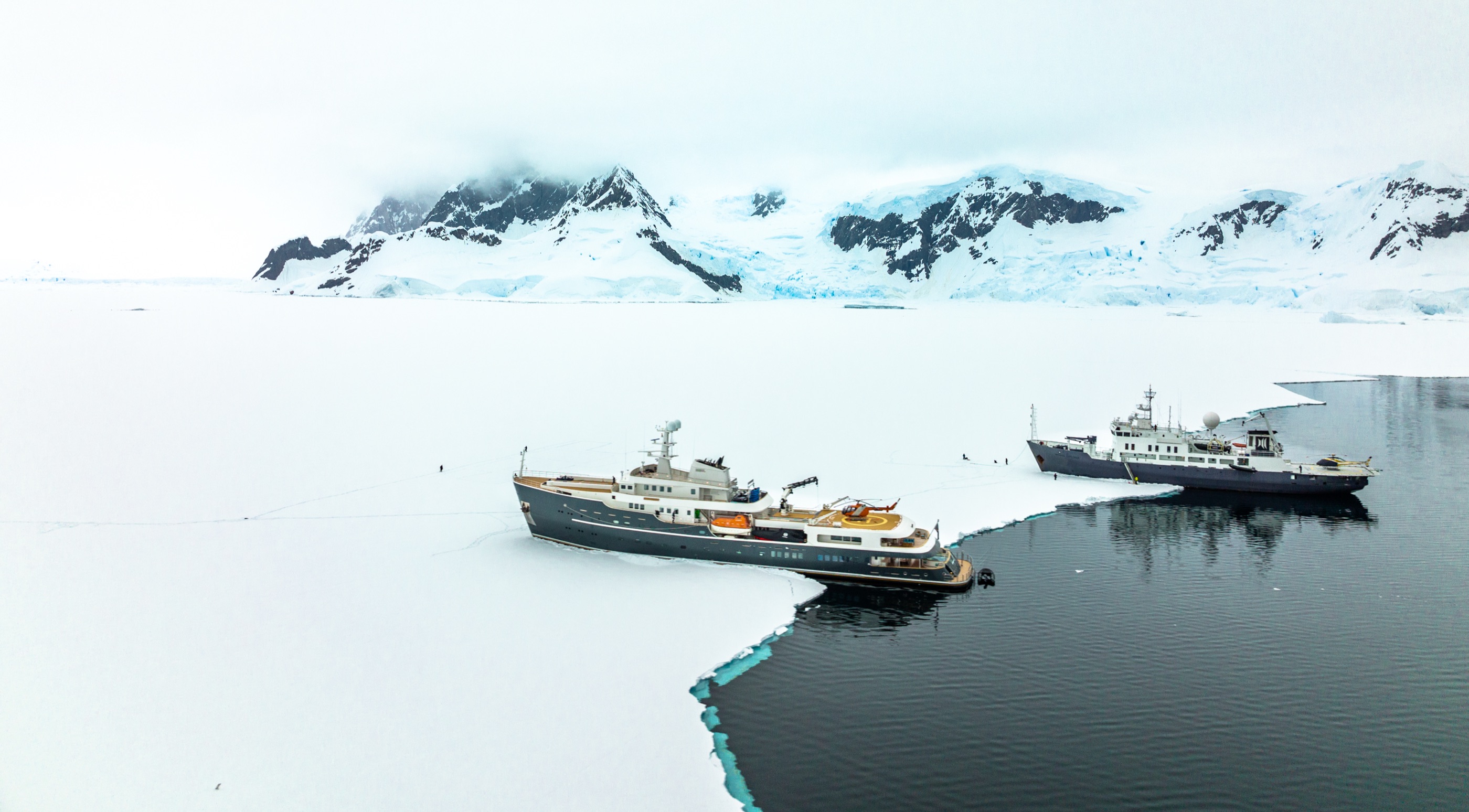 Two explorer yachts at the fast-ice edge, Antarctic Peninsula